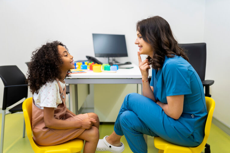 Child and caregiver in consultation.